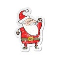 retro distressed sticker of a cartoon santa claus punching air