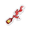 Retro distressed sticker of a cartoon squirting ketchup