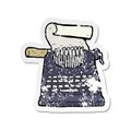 retro distressed sticker of a cartoon typewriter