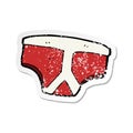 retro distressed sticker of a cartoon underpants