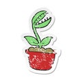 retro distressed sticker of a cartoon venus fly trap