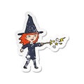 retro distressed sticker of a cartoon witch girl casting spell Royalty Free Stock Photo