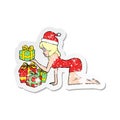 retro distressed sticker of a cartoon woman opening presents