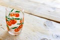 Retro drinking glass with print of oranges