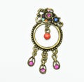 Retro earing made of metal and colorful stone Royalty Free Stock Photo