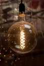 Retro Edison lamp on a dark background Royalty Free Stock Photo