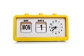 Retro electronic alarm clock and analog flip calendar. Retro design from 60s 70s home interior. Bright yellow color