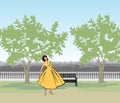 Retro fashion dressed woman 1950`s 1960`s style in city park landscape. Stylish young lady in vintage clothes in summer city Royalty Free Stock Photo