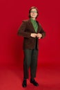 Retro fashion. Studio footage young man, student or office clerk in vintage fashion style costume, suit posing isolated Royalty Free Stock Photo