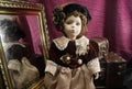 Retro fashioned porcelain doll. Royalty Free Stock Photo