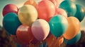 Retro-filtered multicolor balloons, evoking a summer birthday or wedding honeymoon celebration