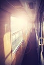 Retro filtered picture of a train coach interior.