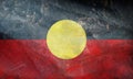 retro flag of Indigenous Australian peoples Aboriginal Australians with grunge texture. flag representing ethnic group or culture