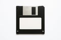 Retro floppy disk on minimalist background celebrating vintage technology and data storage concept in classic design Royalty Free Stock Photo