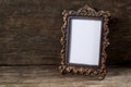 Retro frame for photo on wooden Royalty Free Stock Photo