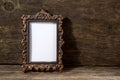 Retro frame for photo on wooden Royalty Free Stock Photo