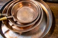 Retro French copper pans found in a antique mal. Royalty Free Stock Photo