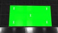 Retro, futuristic stage and blank, green screen billboard for advertisement, message. Chroma key, alpha channel and tracking marke