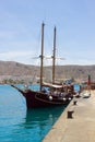 The retro galleon Peter Pan used for tourists fun tours in Teneriffe leaves the quayside at Los Cristianos with crew and passenger