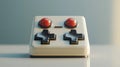 Retro game controller with red buttons and black directional pads on white surface Royalty Free Stock Photo
