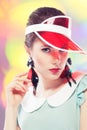 Retro girl in red sun visor Royalty Free Stock Photo