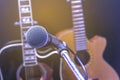 Retro guitar and microphone. Royalty Free Stock Photo