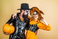 Retro Halloween couple romancing. Halloween design for copy space. Royalty Free Stock Photo