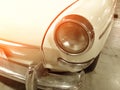 Retro headlight of vintage car, vintage light effect