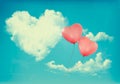 Retro Holiday background with heart shaped cloud on blue sky Royalty Free Stock Photo