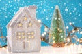 Nostalgic Winter Wonderland: Retro House Toy and Christmas Tree
