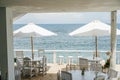 Retro image of a cafe on an ocean shore with scenic view Royalty Free Stock Photo