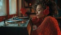 Retro inspired woman engrossed in music playing on a vintage record player