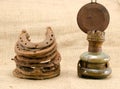 Retro kerosene lamp rusty horse shoes linen