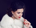 Retro lady. Beautiful Woman in Luxury Fur Coat. Fashion model I Royalty Free Stock Photo