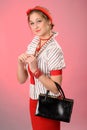 Retro lady with purse Royalty Free Stock Photo