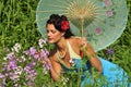 Retro lady in with spring flowers Royalty Free Stock Photo