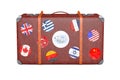 Retro Leather Brown Threadbare Suitcase With Travel Stickers, Metal Corners and Belts. 3d Rendering