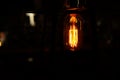 Retro light bulb in the dark background at night Royalty Free Stock Photo