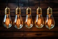Retro light bulbs, teamwork - innovation, leadership - wooden backdrop