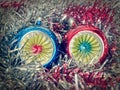 Retro look Christmas bauble and tinsel Royalty Free Stock Photo