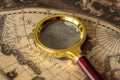 Retro magnifier with old map Royalty Free Stock Photo