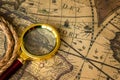 Retro magnifier with old map Royalty Free Stock Photo