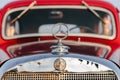Retro Mercedes-Benz beige-scarlet car released in 1938, A rare car, a collectible car. Russia, Saint Petersburg, 08.08