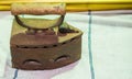 Retro style heavy antique iron tool for ironing Royalty Free Stock Photo