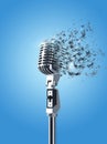 Retro microphone isolated in blue background