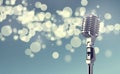 Retro microphone isolated on colorful background Royalty Free Stock Photo