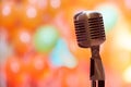 Retro microphone on orange background