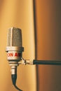 Retro microphone in the recording studio or radio on air Royalty Free Stock Photo