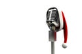Retro microphone with santa hat Royalty Free Stock Photo