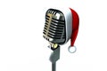 Retro microphone with santa hat Royalty Free Stock Photo